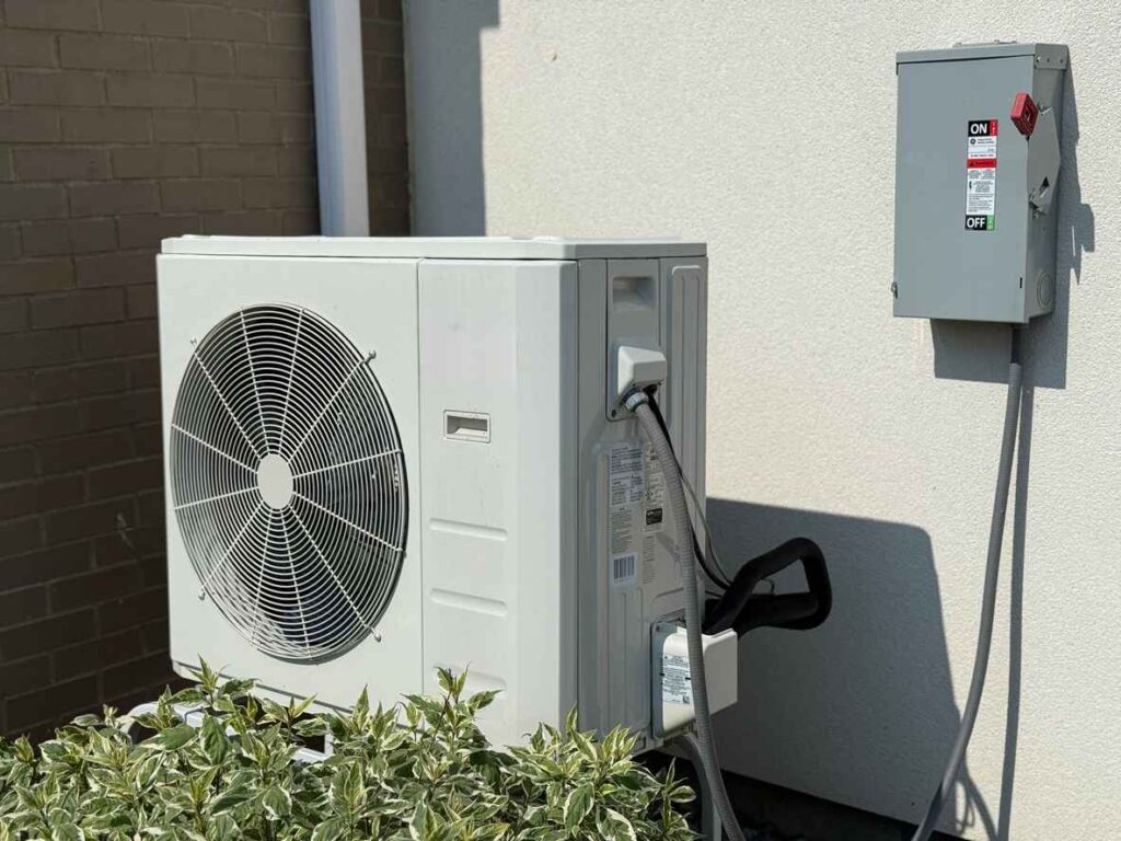heat pump on the side of a house